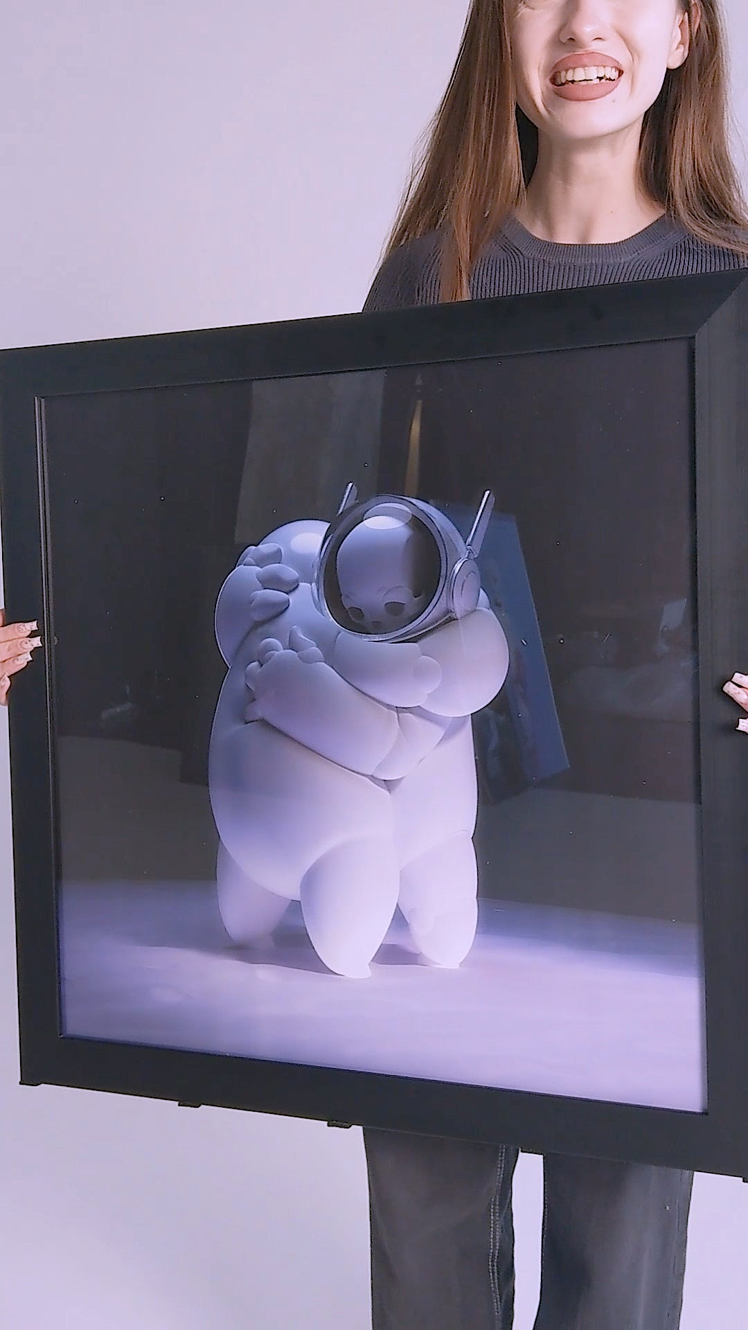 Framed art print of two astronauts embracing, with skulls visible inside their space helmets, set against a cosmic space background