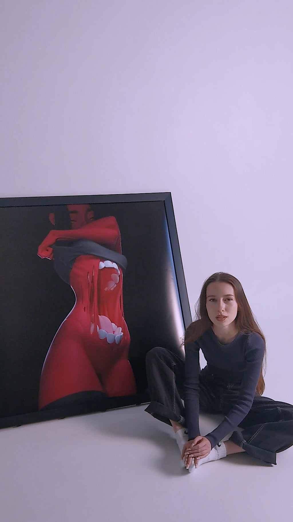 Framed surreal art print of a girl in black and red color palette
