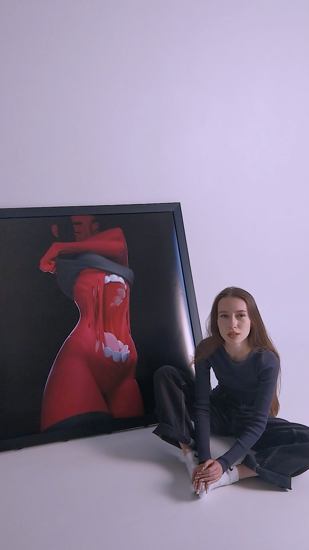 Framed surreal art print of a girl in black and red color palette